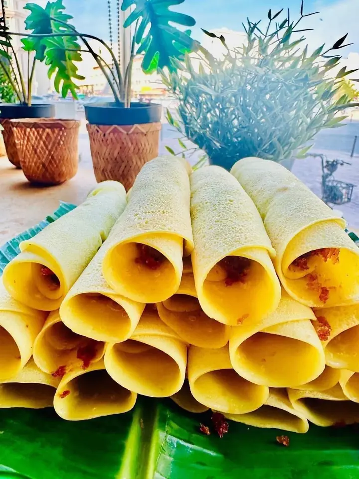Rolled Sri Lankan pancakes with a coconut filling